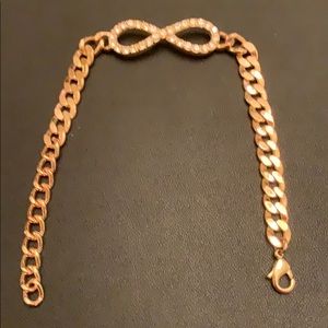 Gold-tone bracelet with rhinestone infinity charm
